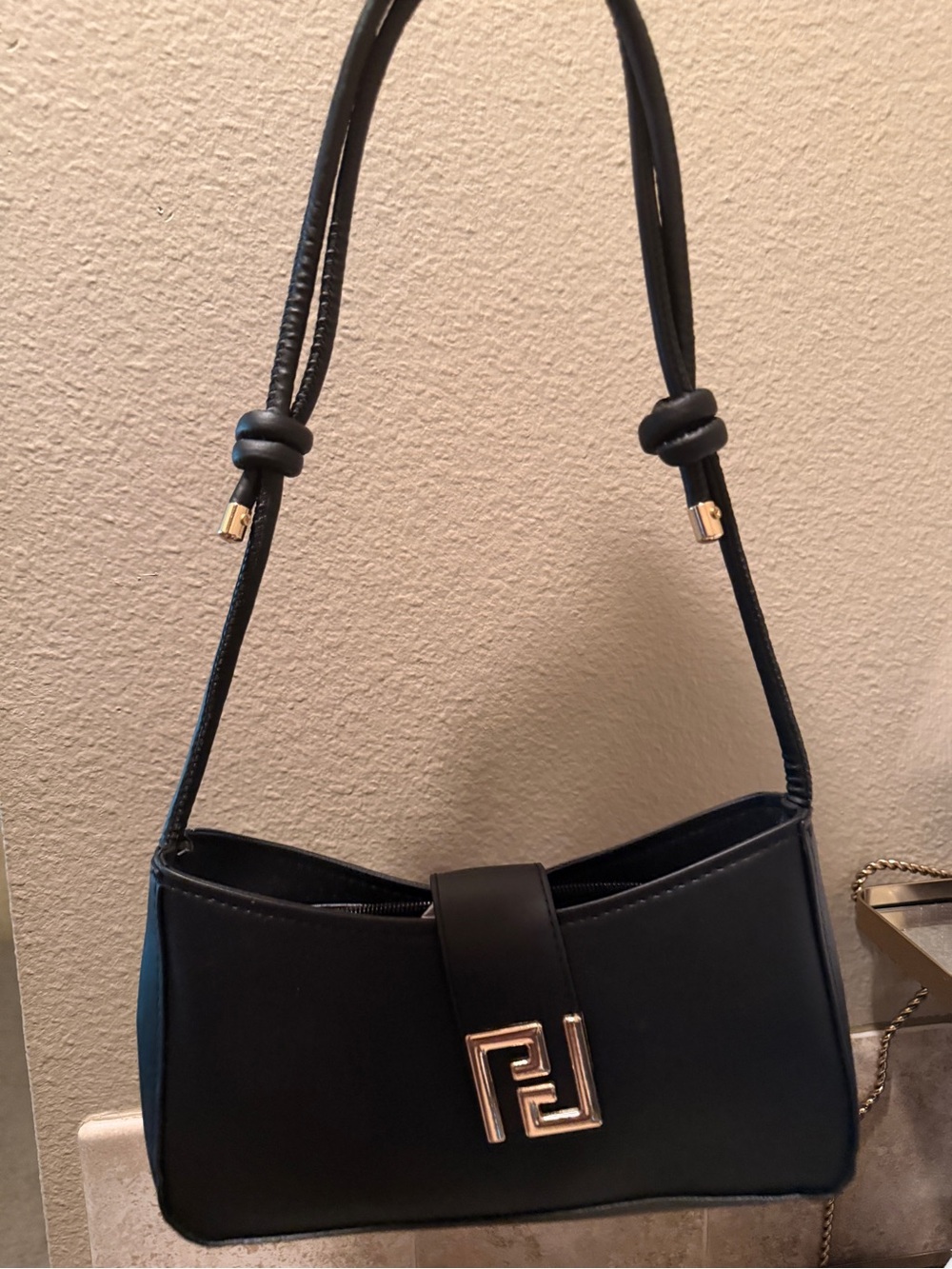 Black Shoulder Bag with Signature Gold Accent